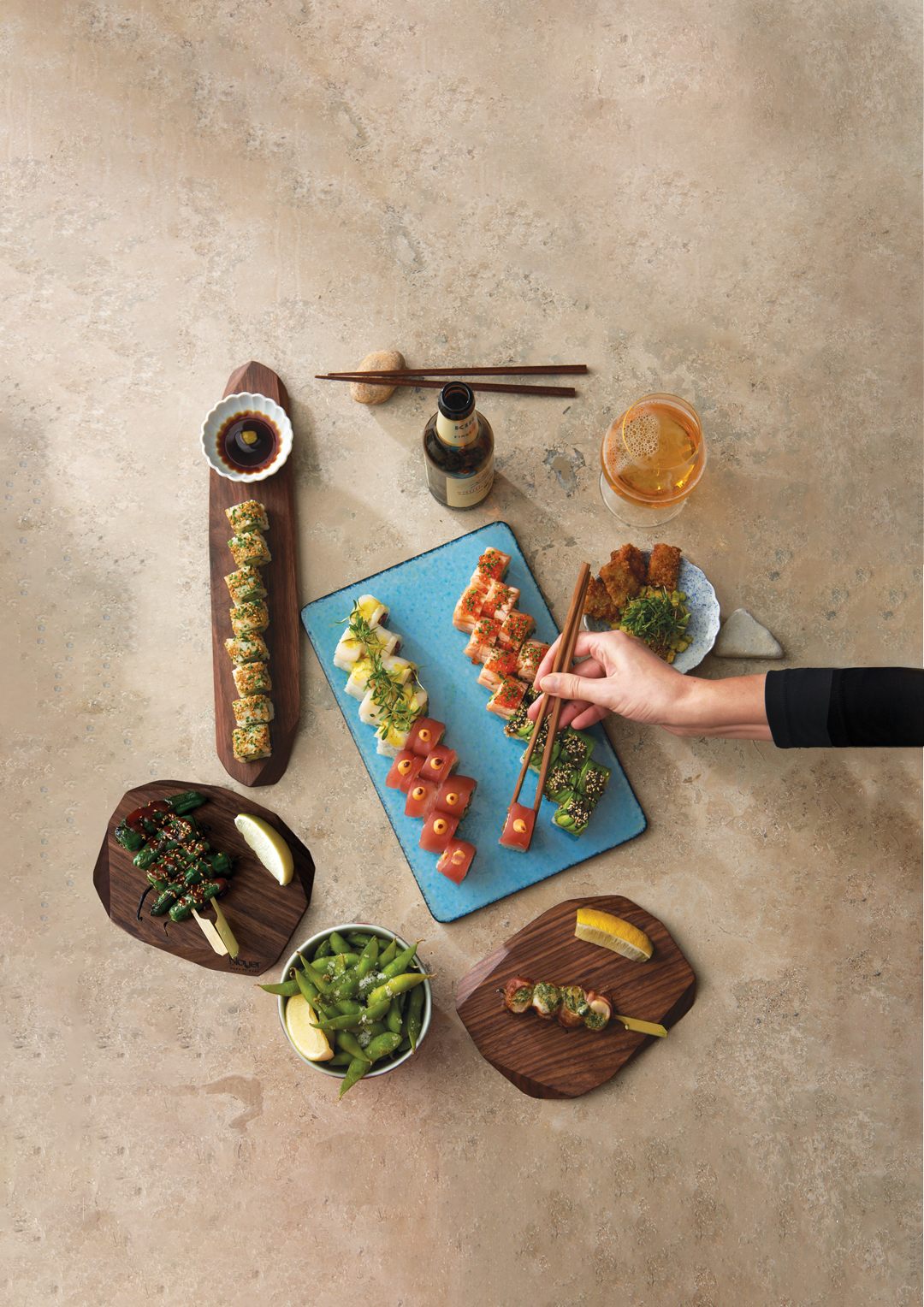 Semi-private dining with vibrant sushi platter for upscale networking events