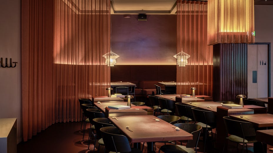 Semi-private dining area in Sticks'n'Sushi Shoreditch, ideal for upscale events and meetings.