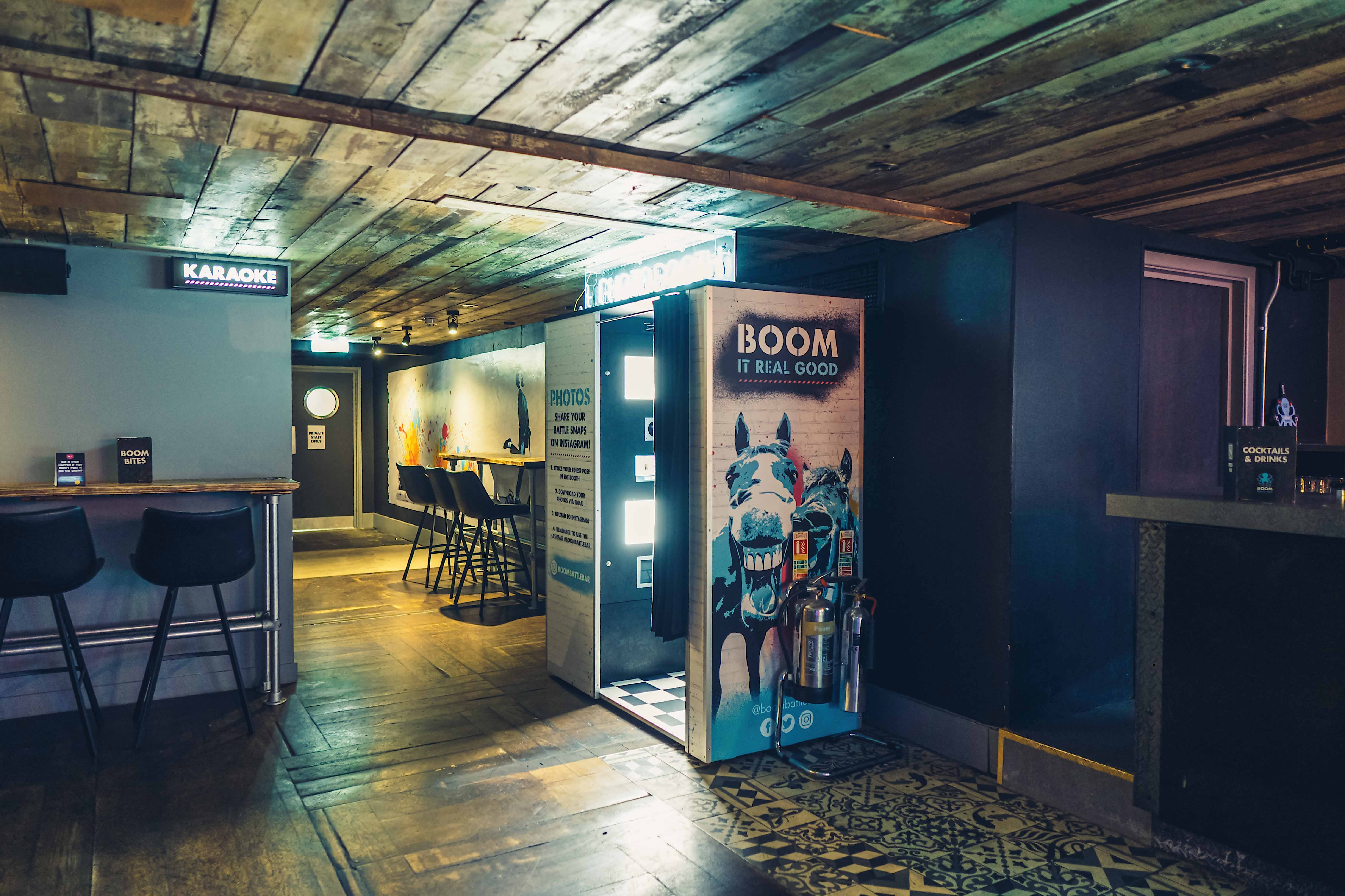 Party Packages at Boom Battle Bar Birmingham with rustic ceiling, ideal for events.