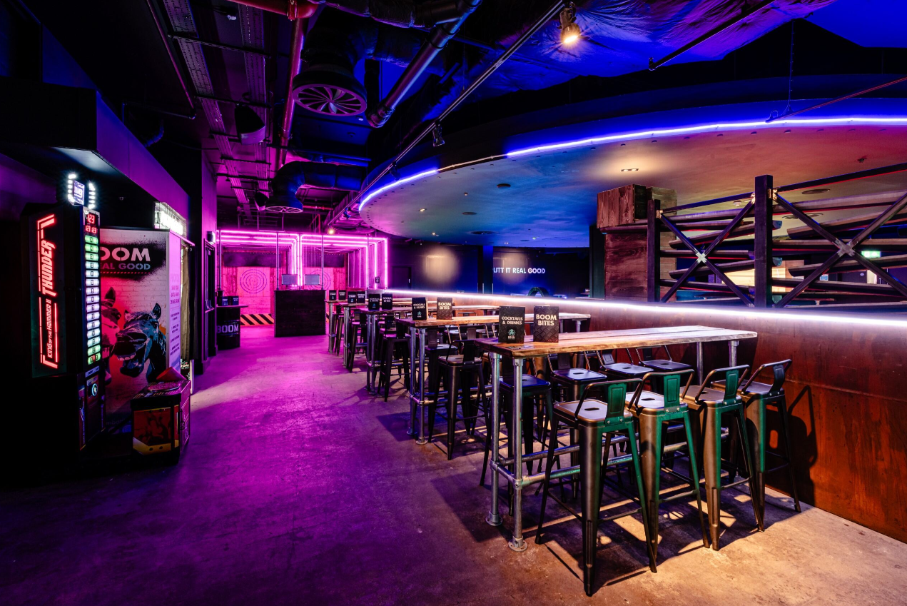 Vibrant event space with neon lighting for corporate functions and private celebrations.