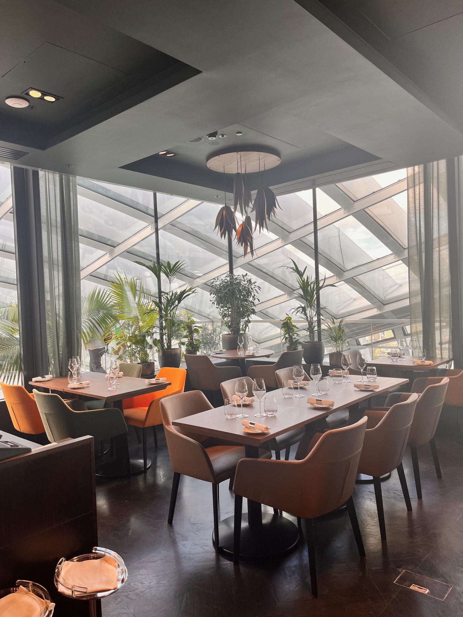 Fenchurch Restaurant in Sky Garden London, modern dining with glass ceiling, ideal for events.