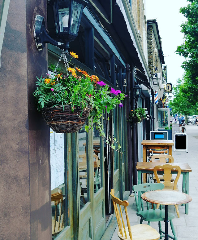 Charming outdoor café at Dan & Angel Restaurant, perfect for networking events.