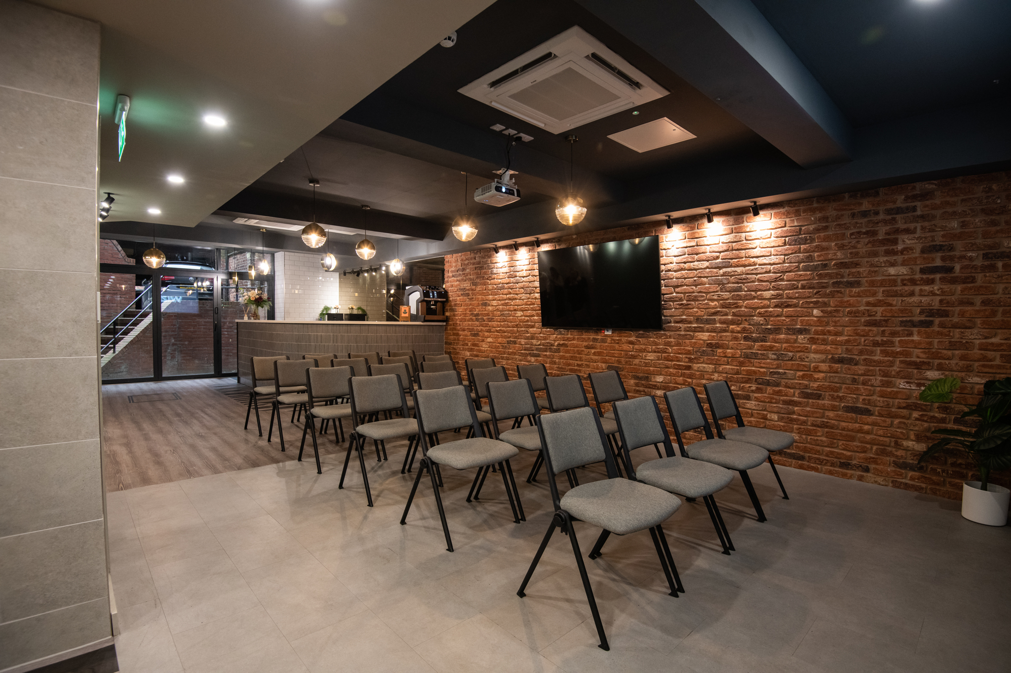 Park Place Event Space with modern decor, ideal for workshops and seminars.