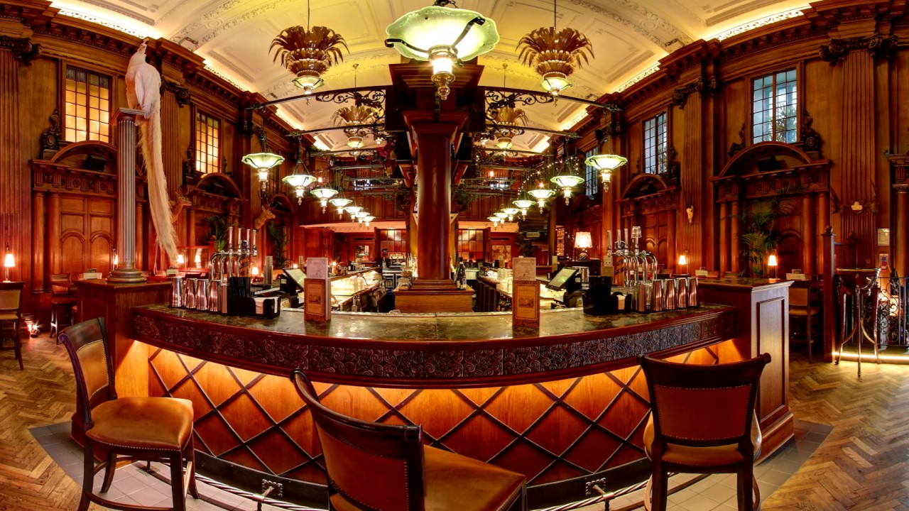 Live music bar with rich wood interiors, ideal for upscale events and gatherings.