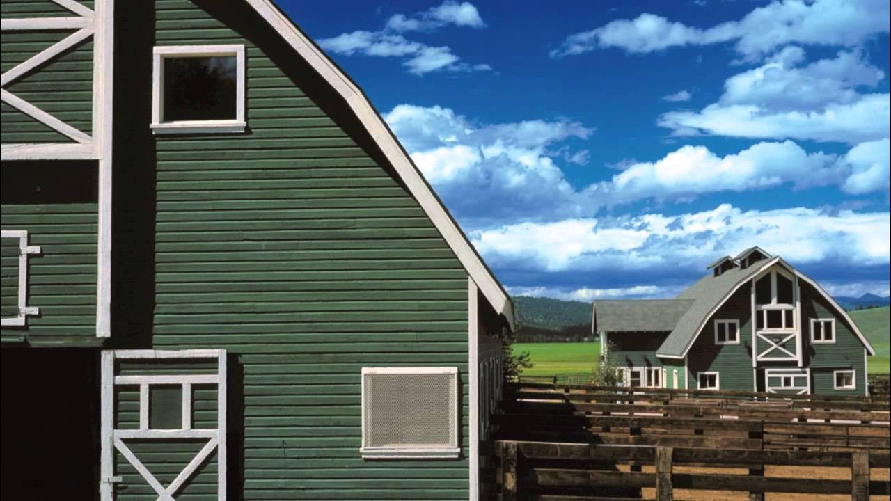 Bull Barn at Paws Up: rustic green barn ideal for outdoor events and retreats.