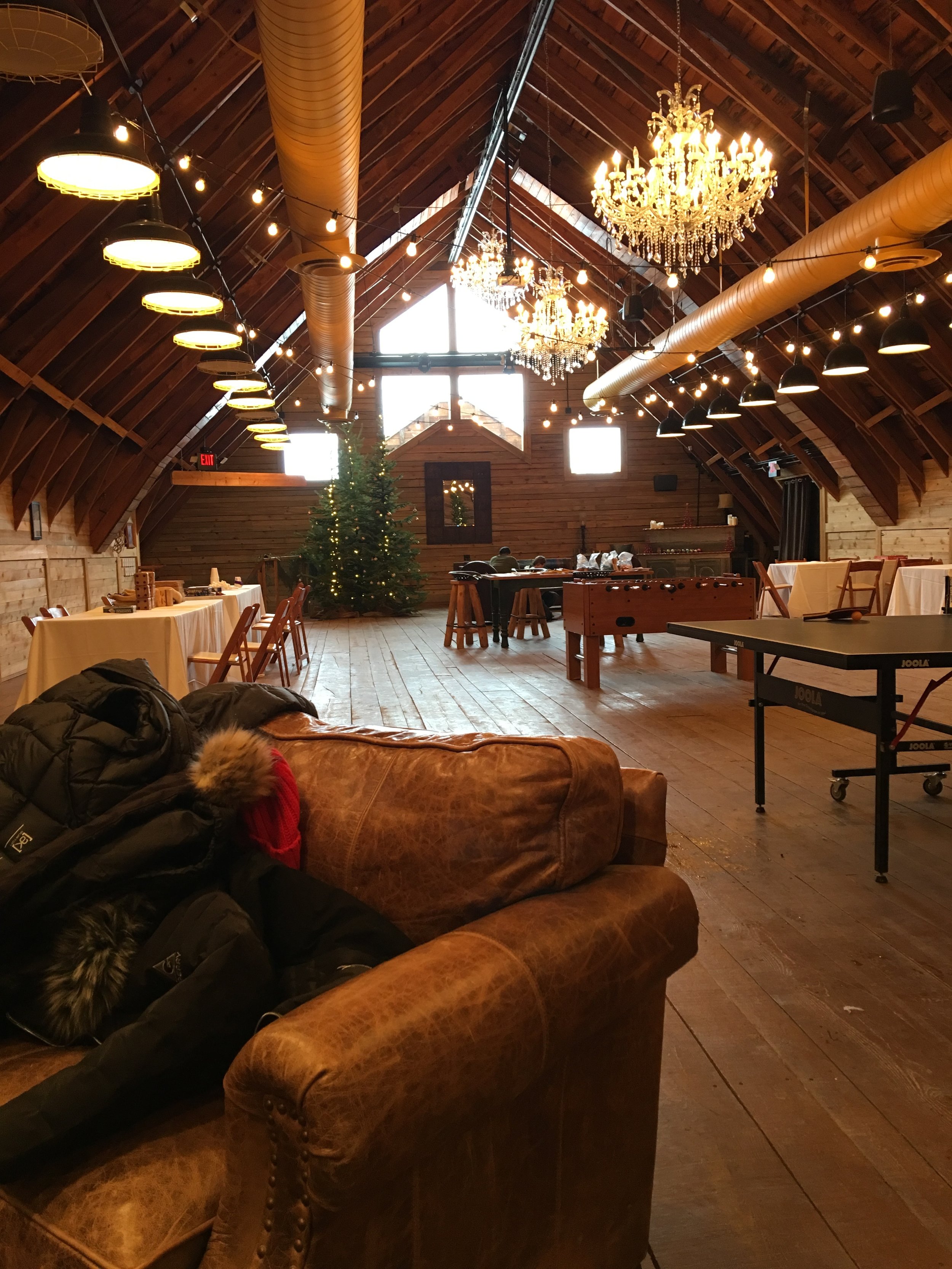 Rustic Bull Barn venue with warm wood interior, ideal for intimate events and gatherings.