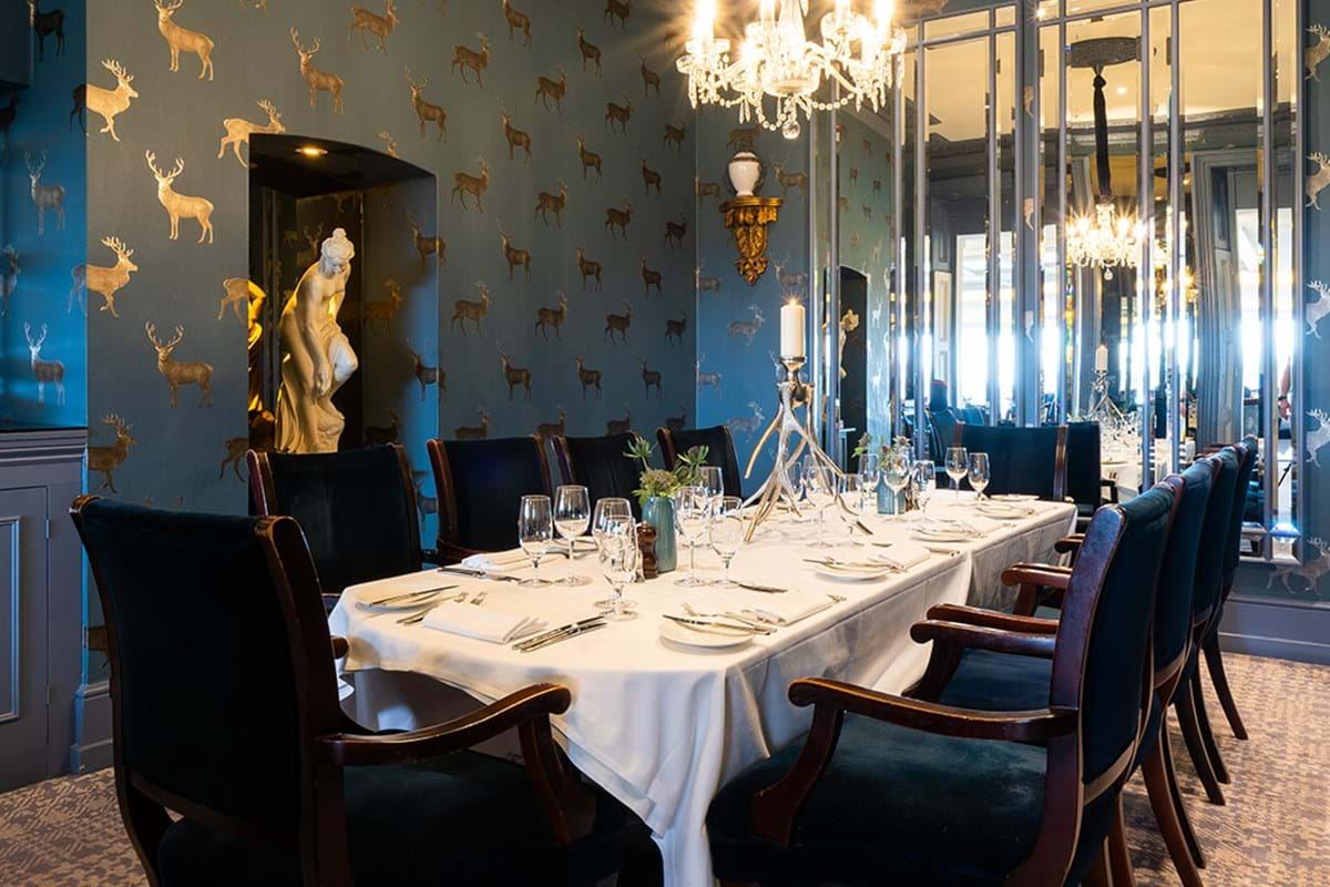 Elegant dining table at The Alcove, perfect for corporate dinners and private events.
