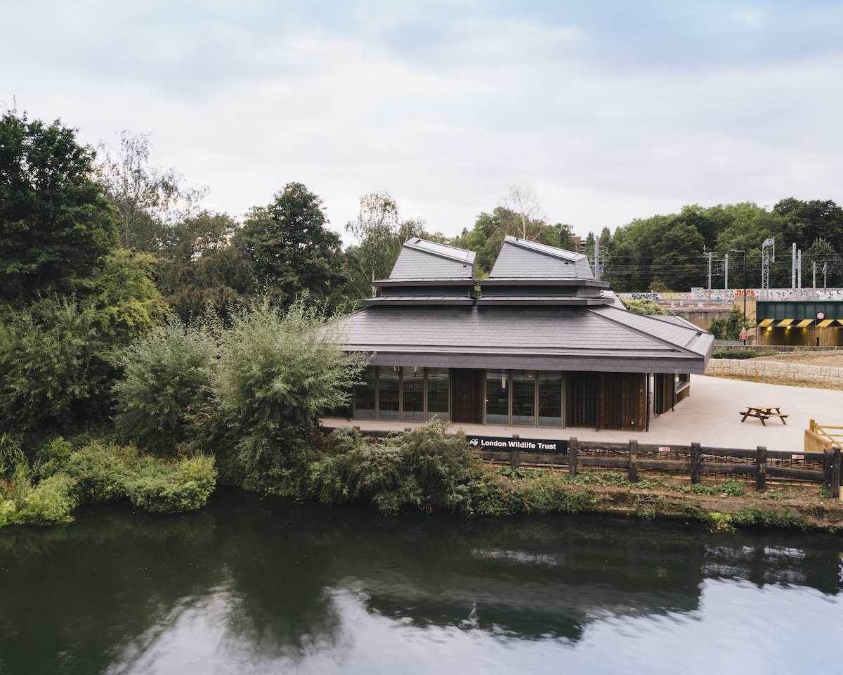 Eco-friendly venue by serene pond in Camley Street Park for corporate events.