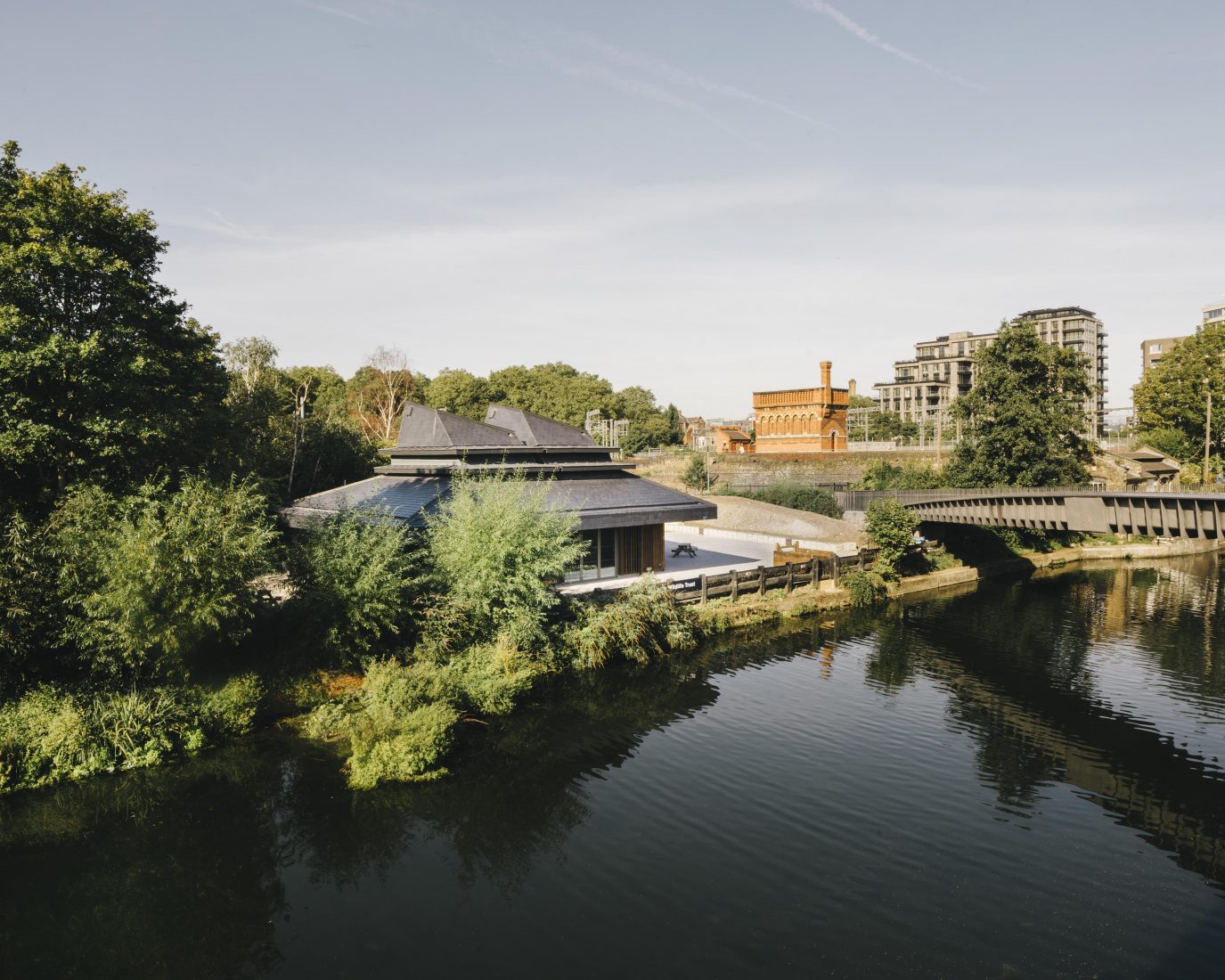 Meadow at Camley Street Park, London: serene outdoor venue for events by water.