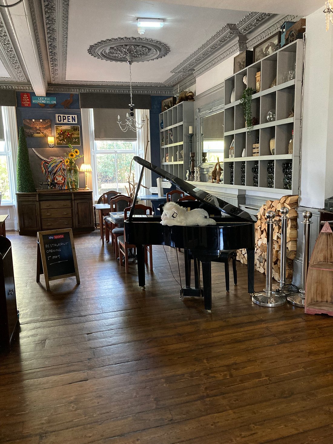 Charming Armstrong Manor bar with grand piano, perfect for intimate events and receptions.