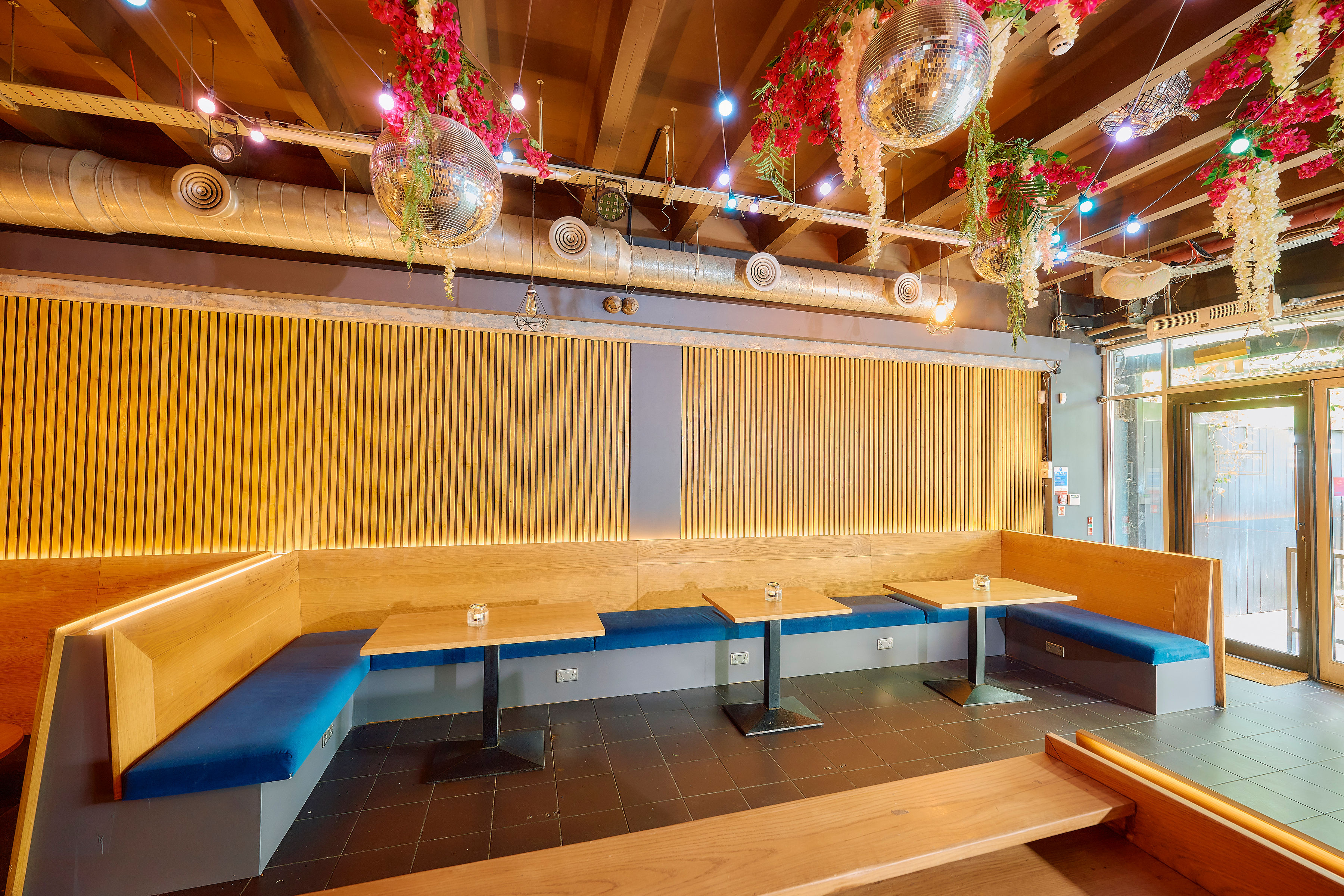 Hoxton event space disco balls floral accents party