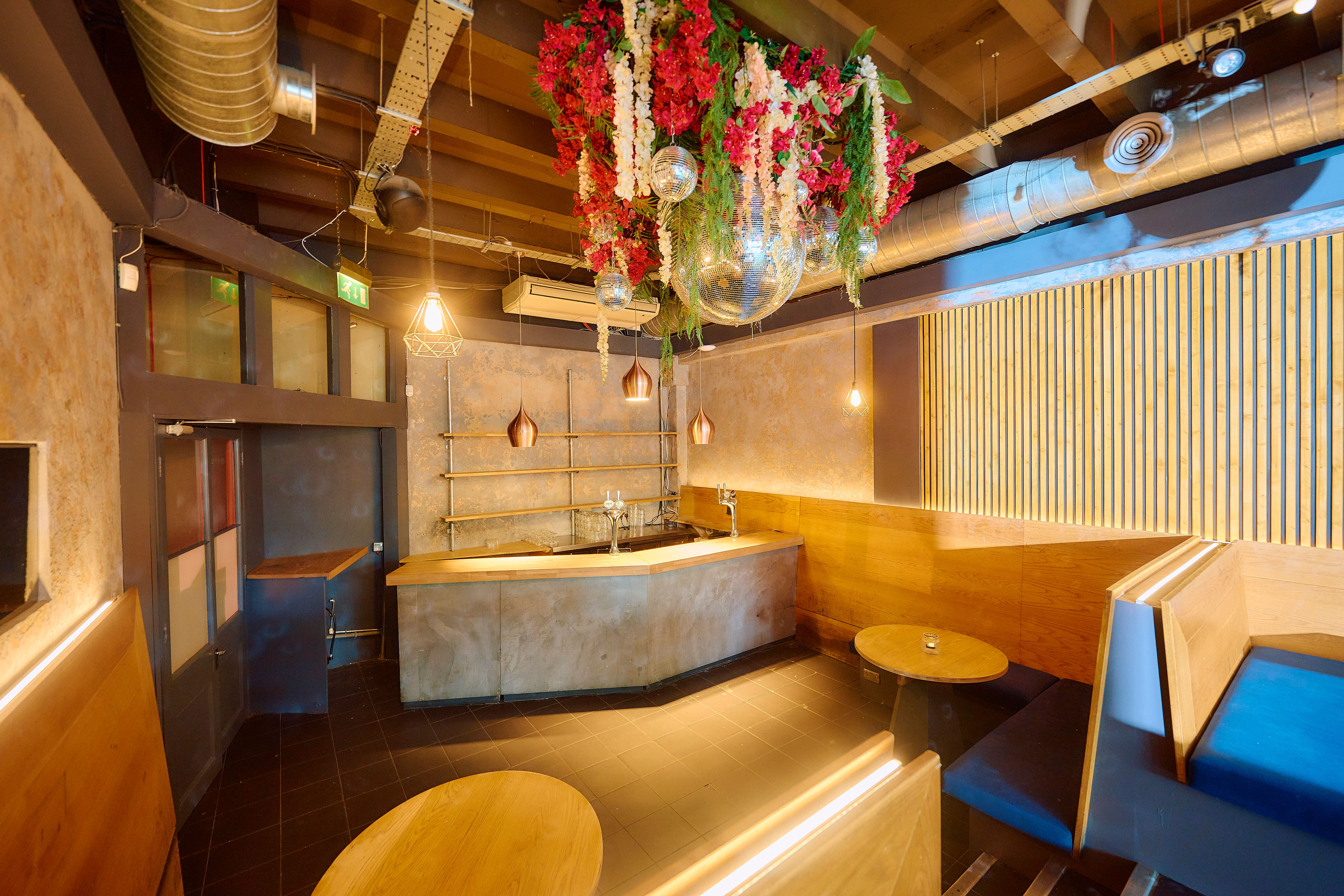 Hoxton Green Room industrial chic event venue disco ball flowers