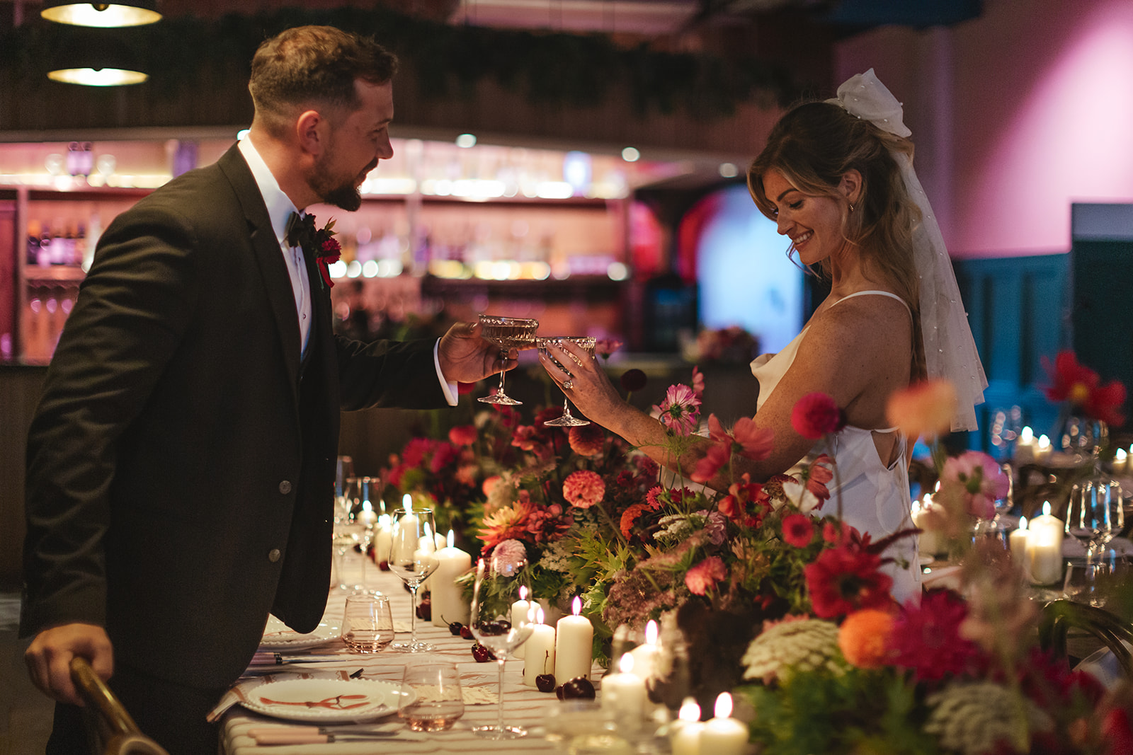 Elegant wedding reception at Main Bar & Terrace with floral arrangements and candlelight.