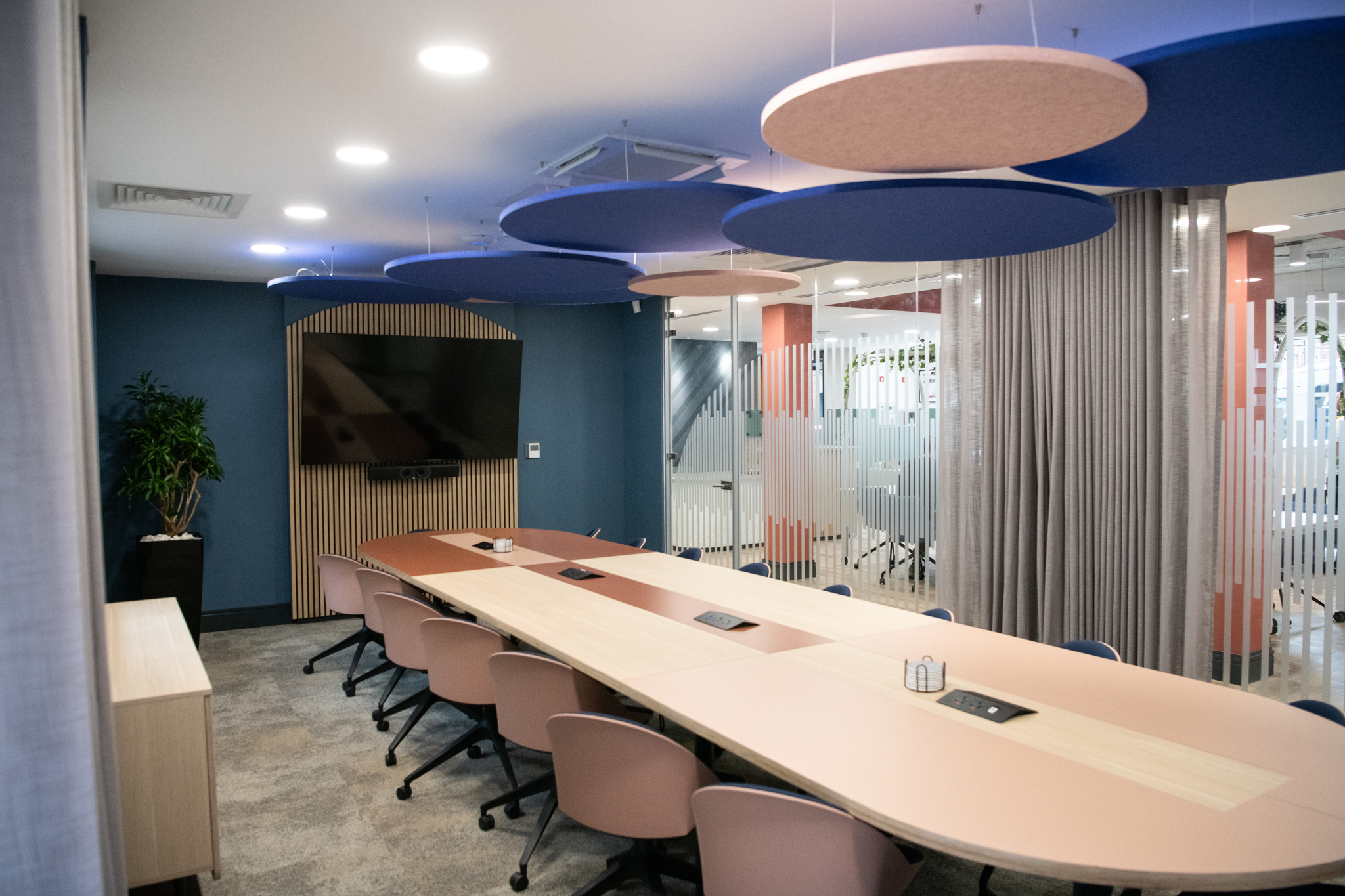 Modern conference room in Millennium Suite, Wizu Workspace, ideal for collaborative meetings.