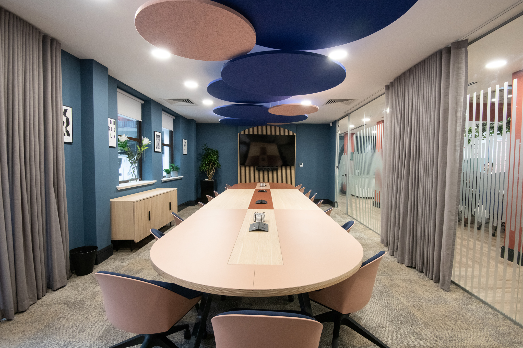 Modern conference room in Millennium Suite, Wizu Workspace, ideal for meetings and collaboration.
