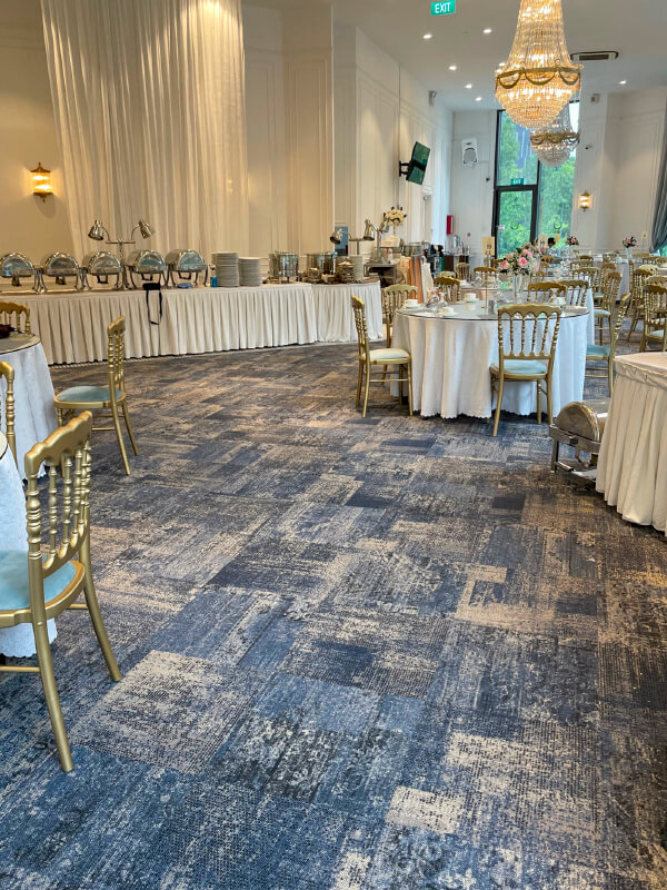 Chandelier Ballroom event space with elegant tables, perfect for celebrations and receptions.