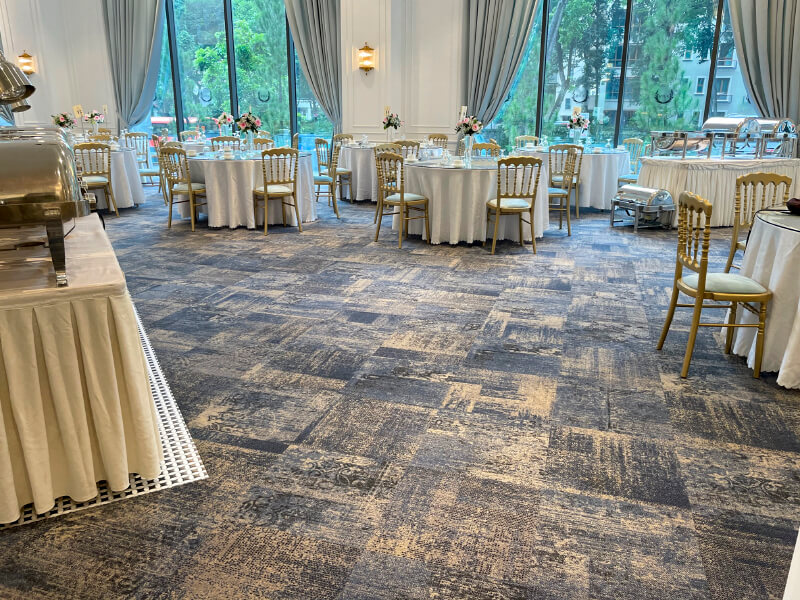 Chandelier Ballroom event space with elegant tables, ideal for formal gatherings and social events.