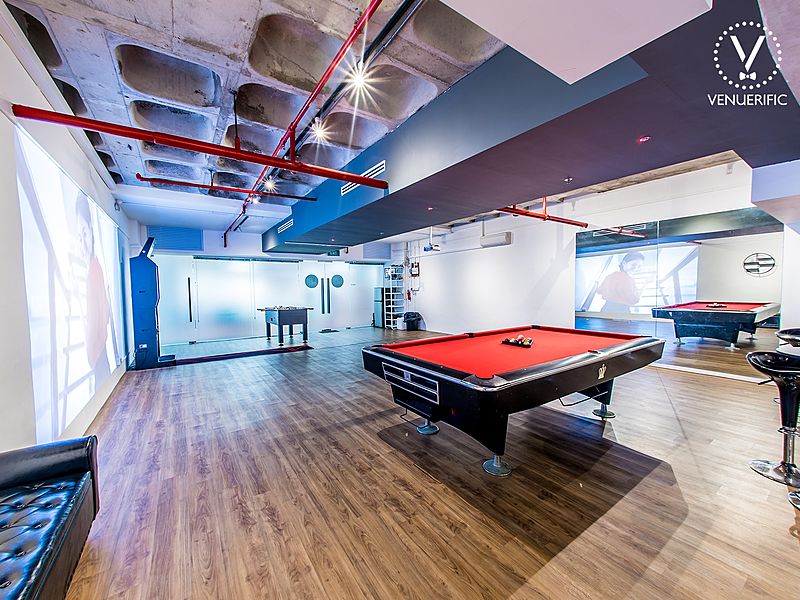 Urban Tavern Okio event space with vibrant pool tables for casual gatherings and meetings.