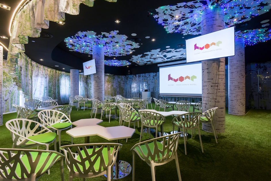 Creative meeting space with nature-inspired decor for workshops and presentations.