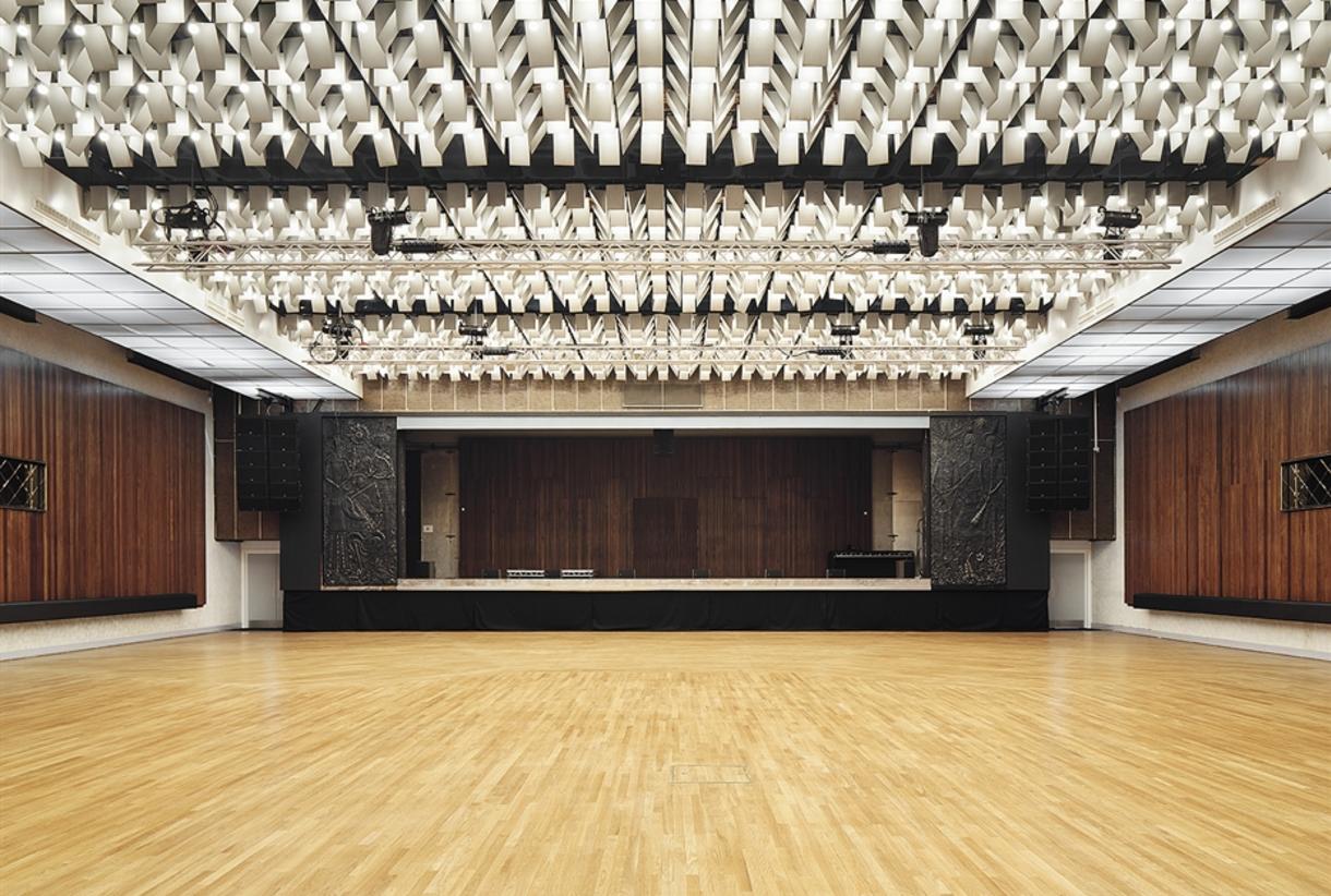 New Century Hall Manchester: spacious venue with polished wood floor for events and performances.
