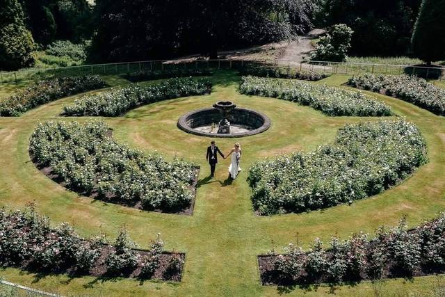 Temple Garden at Sandon Hall: lush greenery, elegant fountain, perfect for weddings and events.