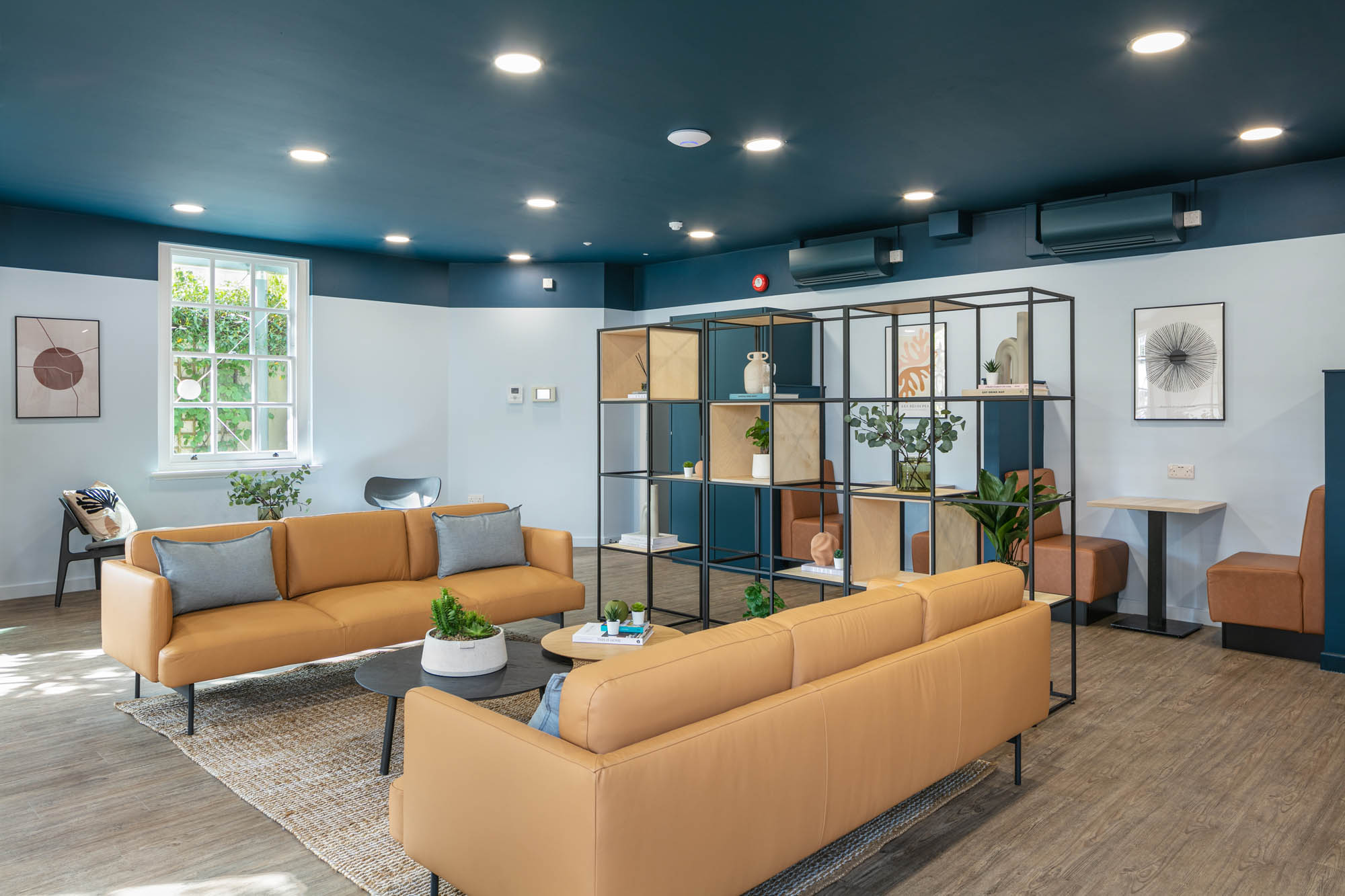 Modern lounge area in Common Ground Co Working, perfect for networking events and meetings.