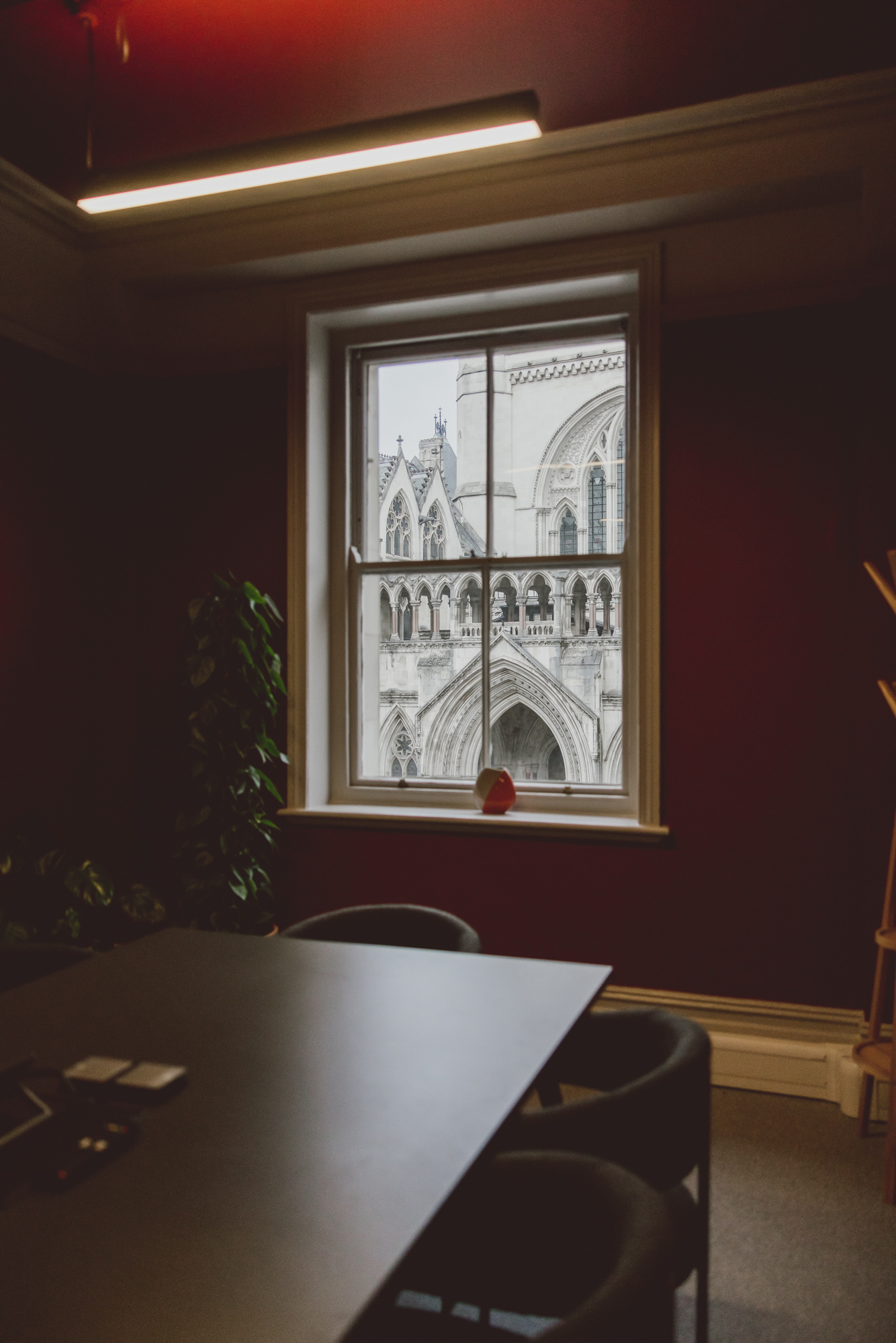 Modern meeting space with historic architecture view for strategic sessions.