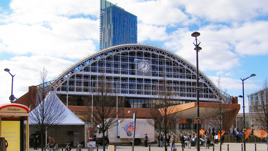 Manchester Central Convention Centre with glass windows, ideal for conferences and trade shows.
