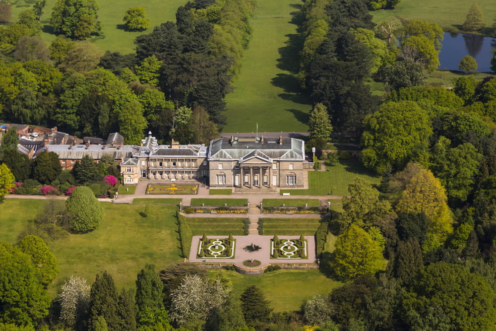 Tatton Park courtyard with elegant architecture, ideal for corporate retreats and weddings.