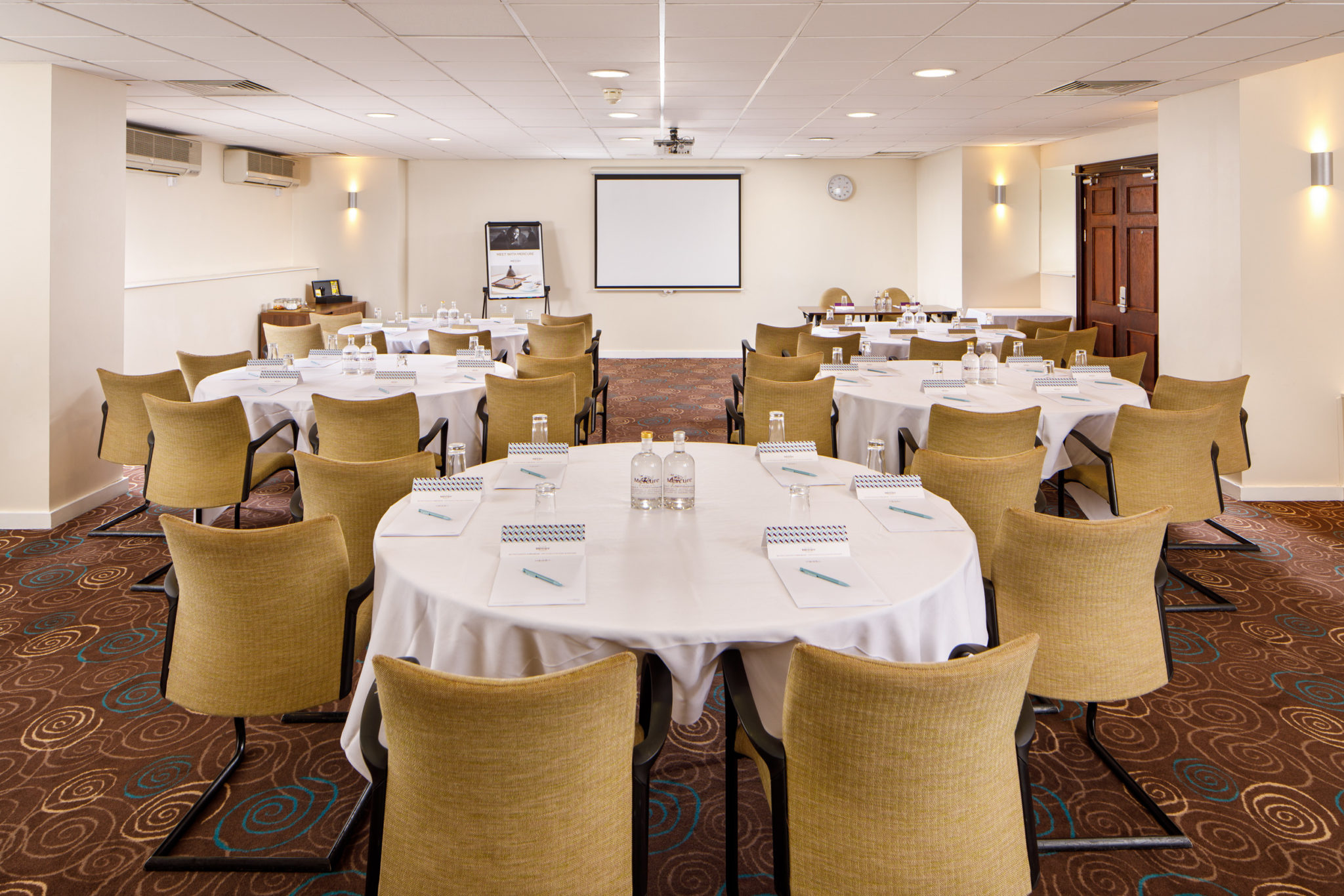 Meeting room at Mercure Manchester Piccadilly, ideal for corporate events and workshops.