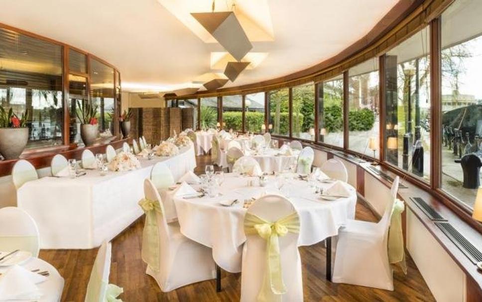 Elegant event space at Copthorne Hotel Manchester with round tables for weddings and corporate events.