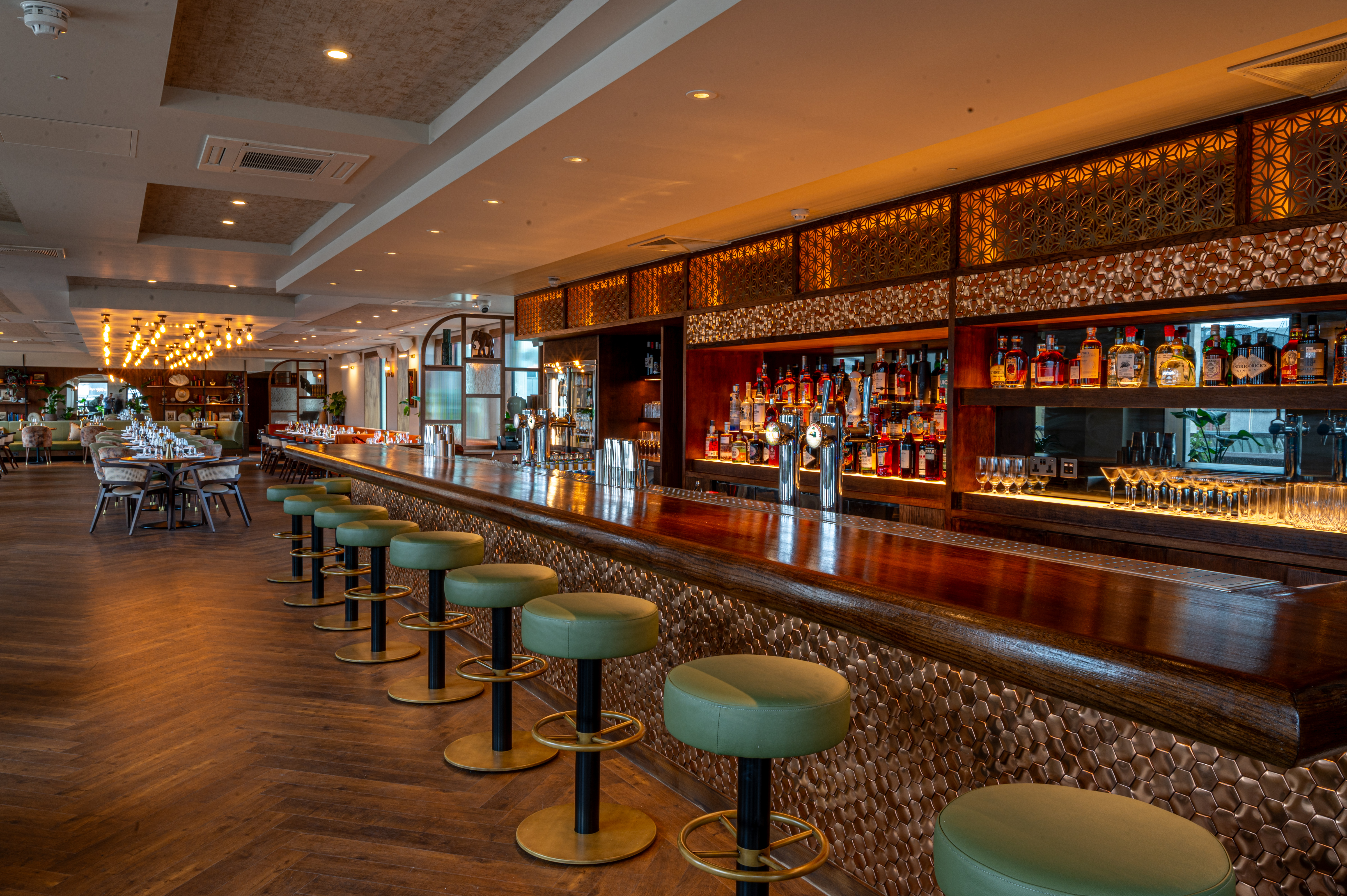 Stylish bar area in Kitty Hawk, perfect for networking events and social gatherings.