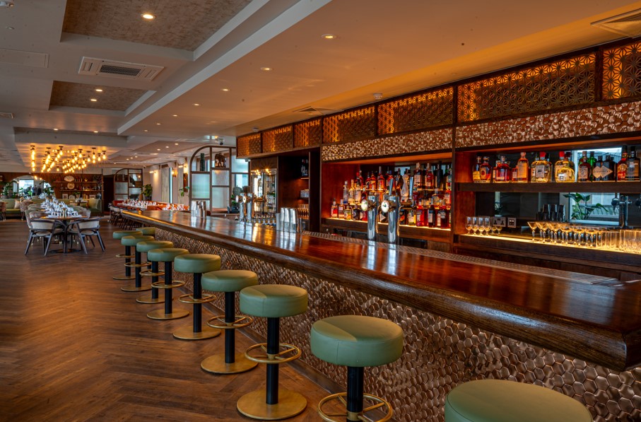 Stylish bar area in Kitty Hawk, ideal for networking events and social gatherings.