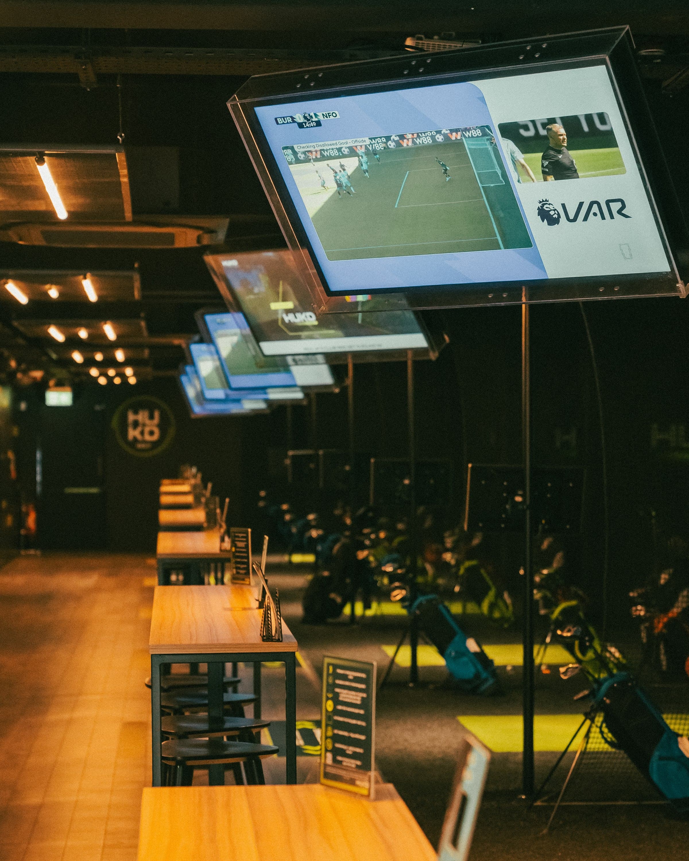 HUKD indoor golf simulator setup for corporate events and private parties.