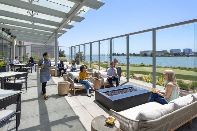 Outdoor terrace at Grand Palace Seafood Restaurant with waterfront view, ideal for events.