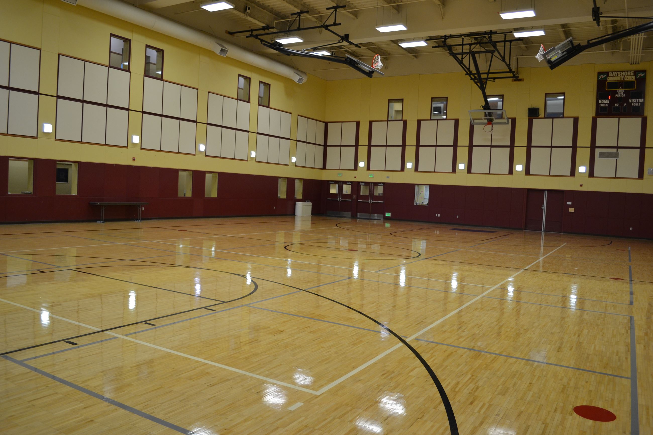 Bayshore Community Center auditorium with polished floors for events and gatherings.