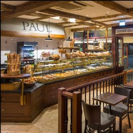 Charming Holland Park cafe with fresh pastries, ideal for networking events and meetings.