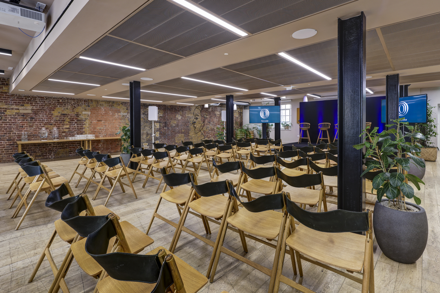 Event space at The Forum with industrial design, ideal for presentations and networking.