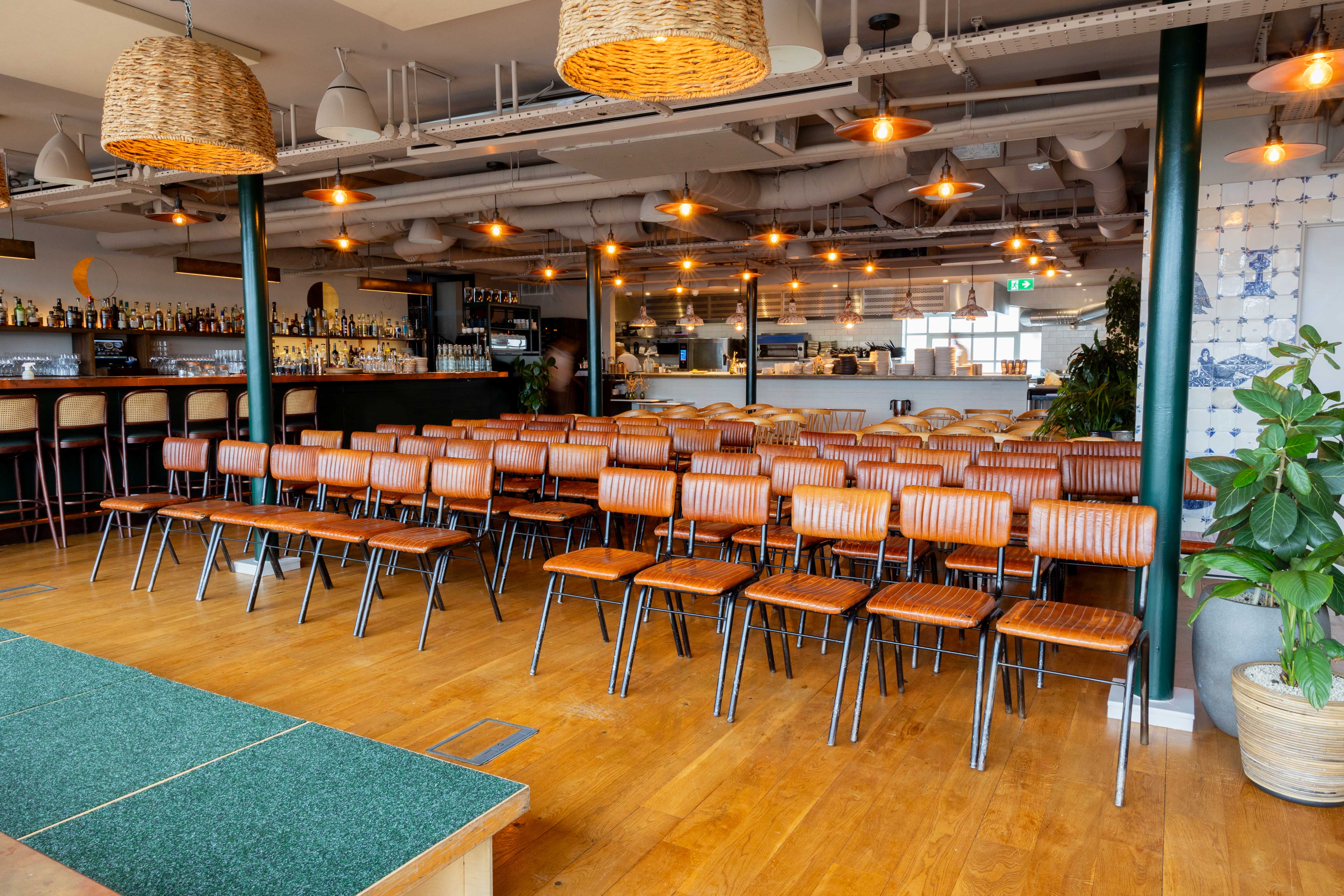 Rooftop restaurant event space with pergola and bar