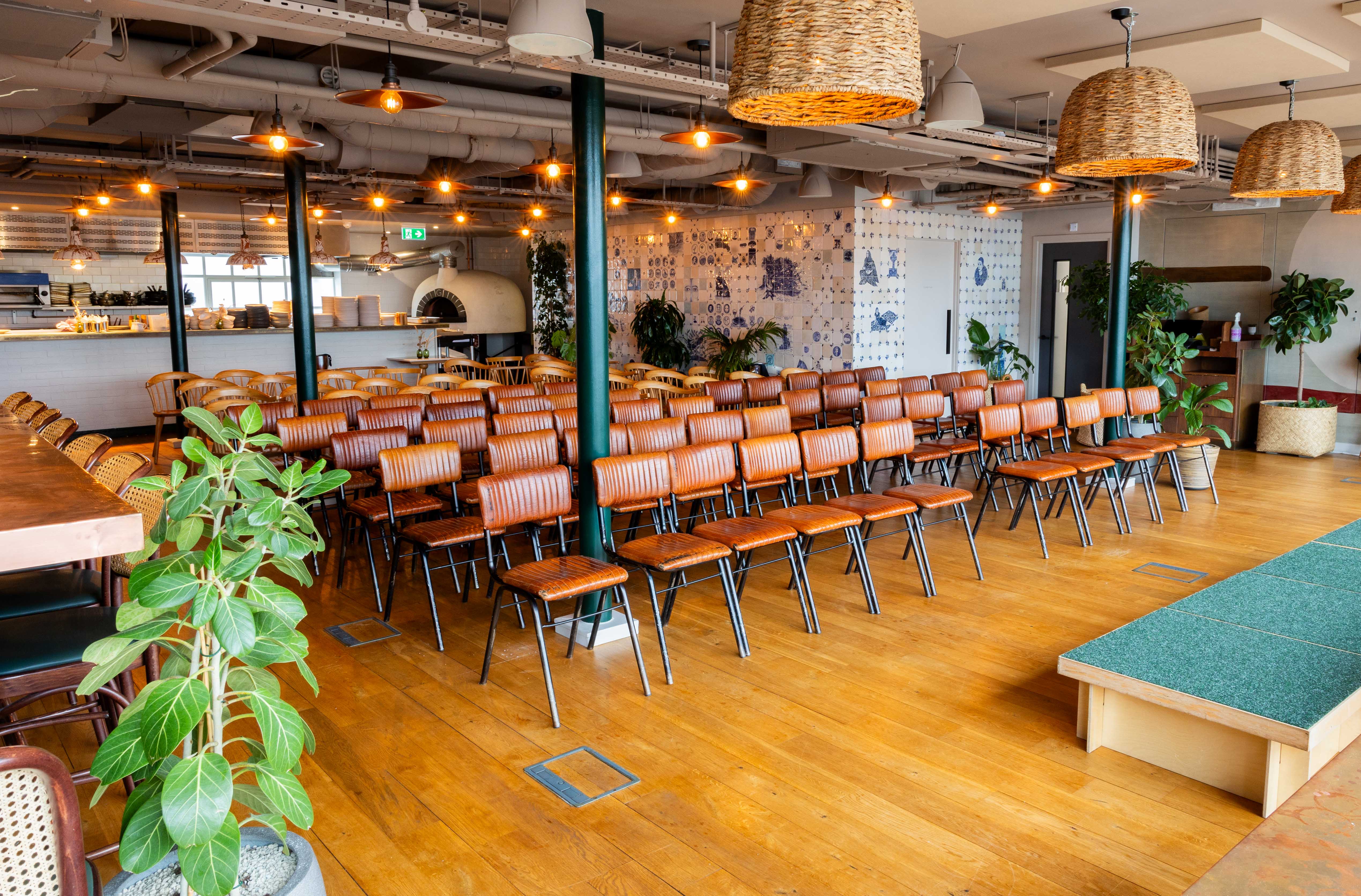 Rooftop restaurant event space with wood, workshop, presentation