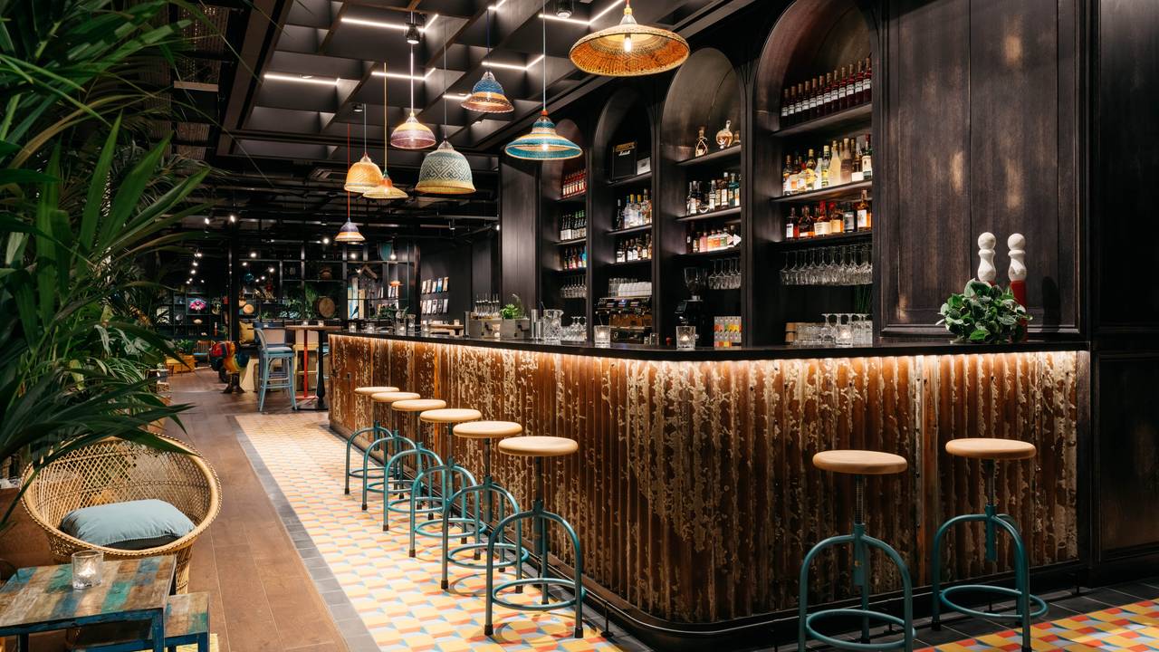 Stylish bar at Ruby Zoe Hotel, perfect for networking events and cocktail receptions.