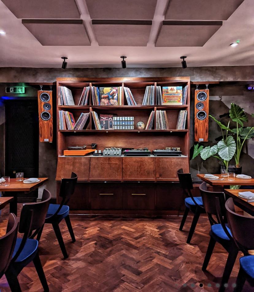 Stylish Green Room restaurant in Caia London with vintage vinyl decor, perfect for events.