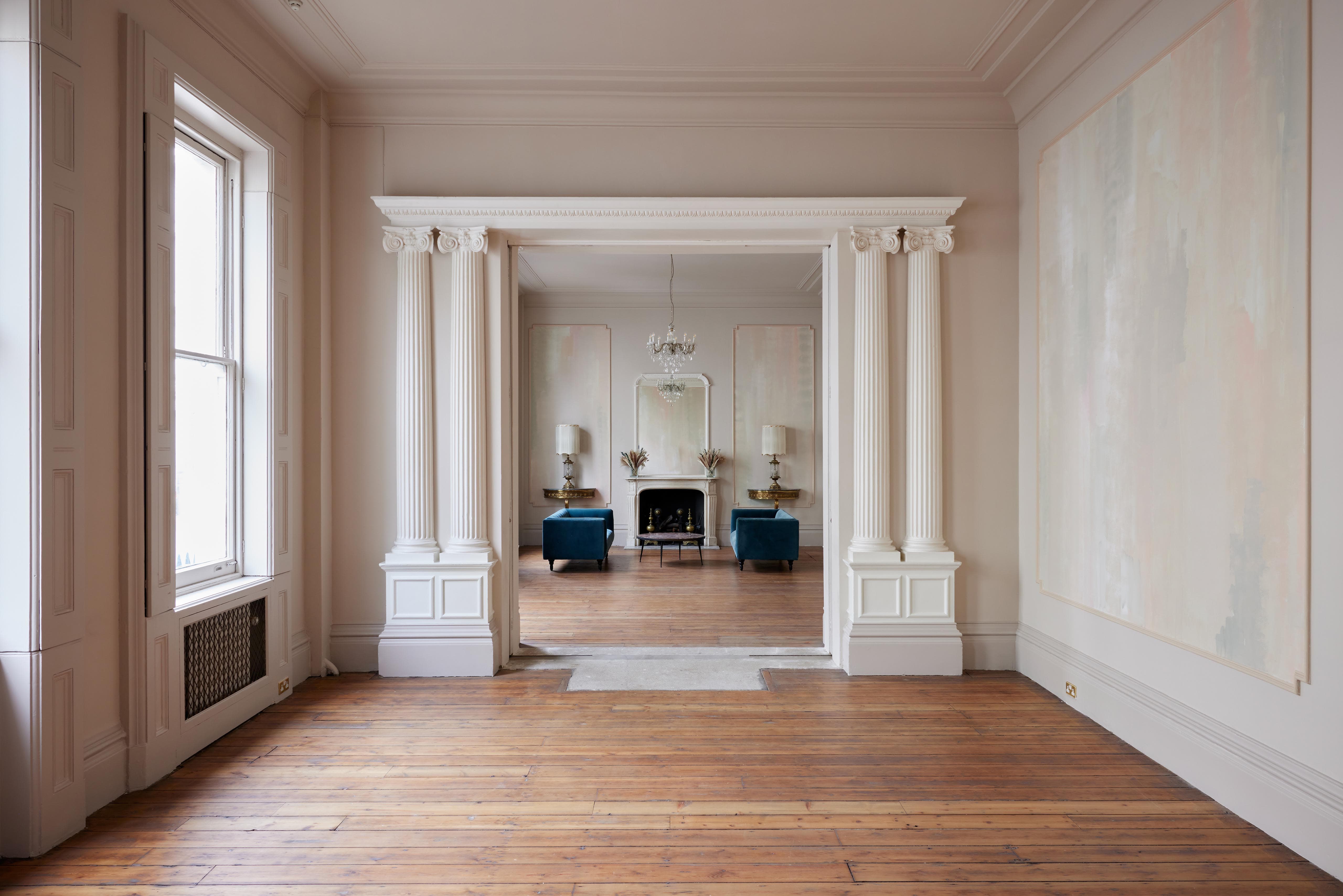 Elegant Lancaster Suite venue with large windows, perfect for meetings and events.