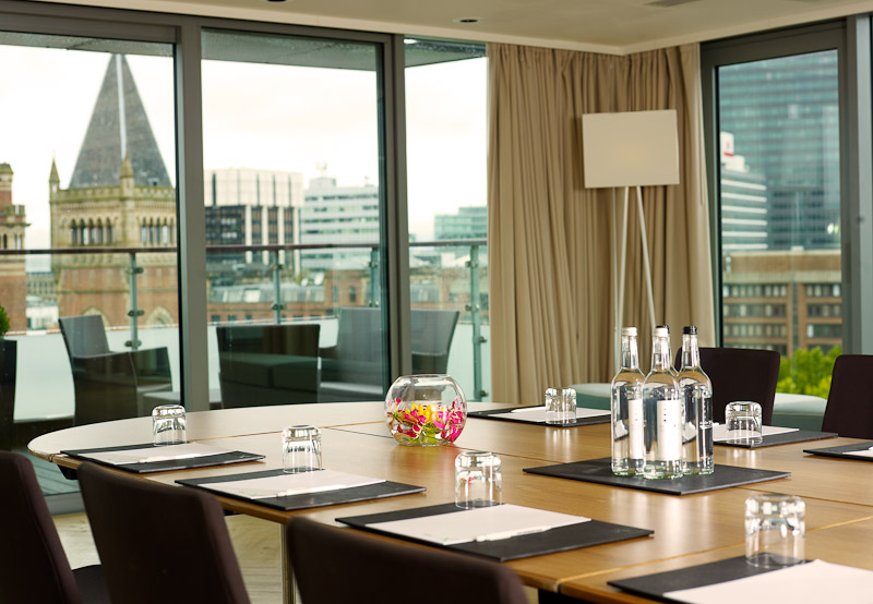 Sky Lounge meeting room at DoubleTree Manchester with city views, perfect for networking events.