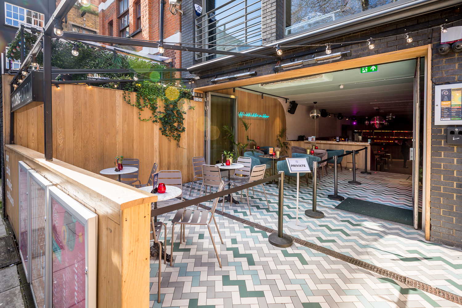 Main Bar & Terrace at Colours Hoxton, stylish outdoor venue for events and gatherings.