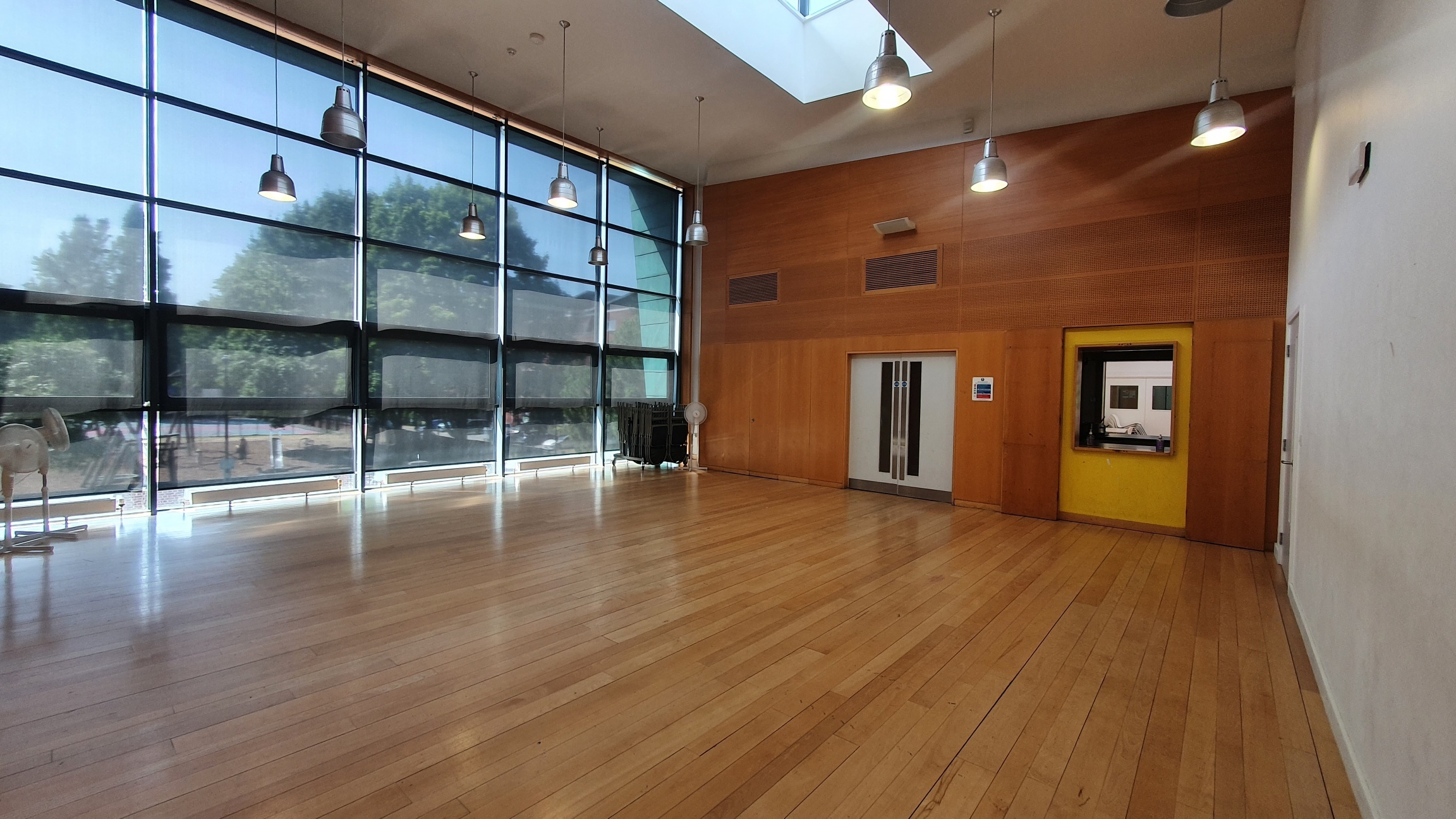 Spacious, well-lit interview room at Barnsbury Community Centre for workshops and events.