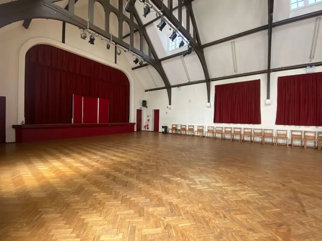 Large Hall in Barnsbury Community Centre with polished wooden floor for events and meetings.