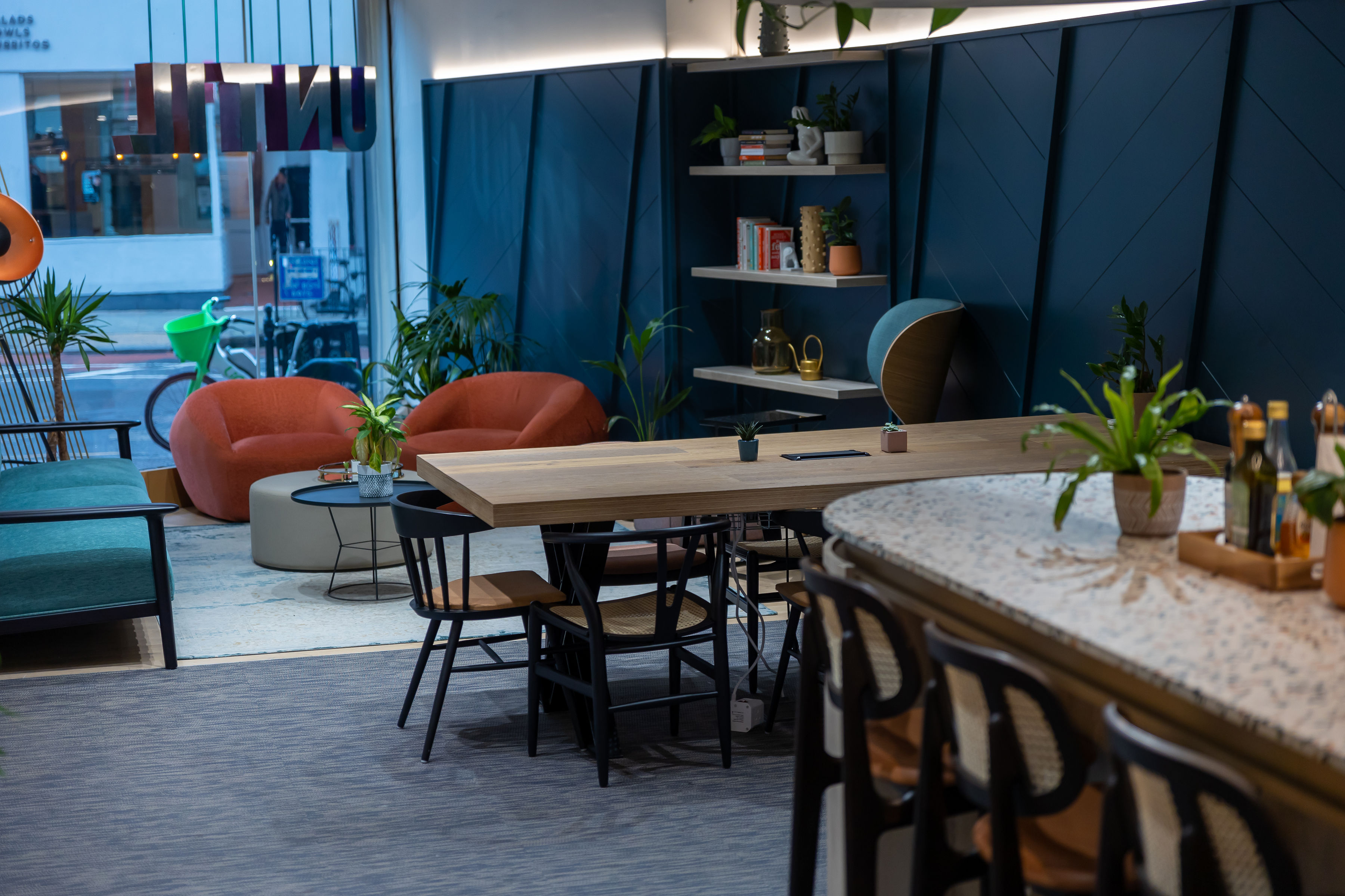 Modern meeting space in UNTIL Soho with natural light, ideal for creative events.