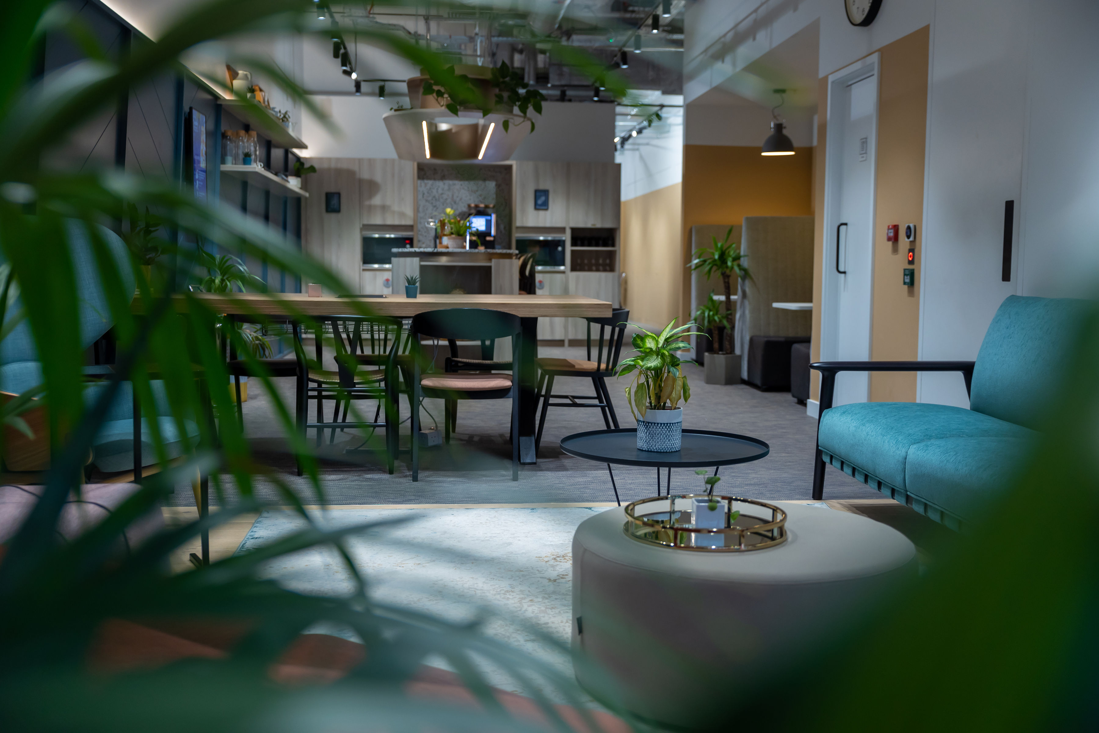 Modern meeting space in UNTIL Soho, featuring comfortable seating for collaboration events.