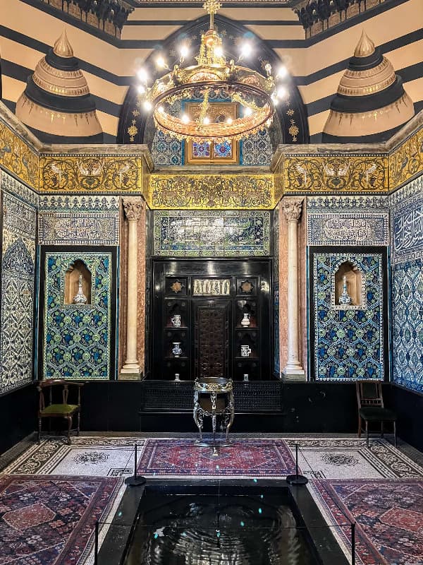 Arab Hall in Leighton House with intricate tile work, perfect for cultural events.
